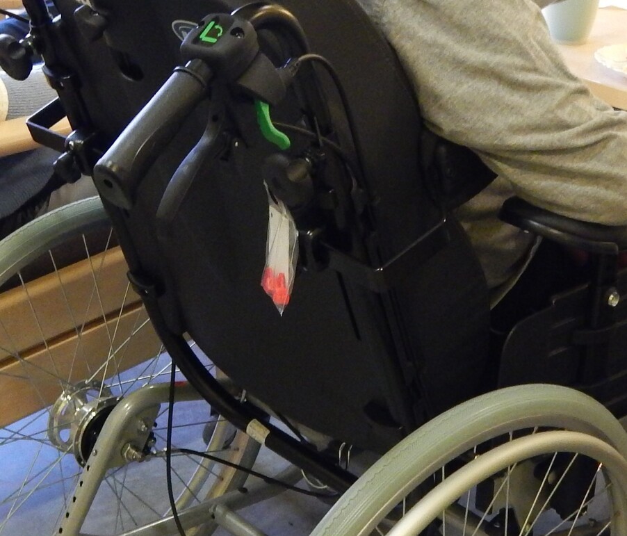 Symbolbild Pflege, Rollstuhl